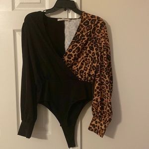 Black and leopard body suit. NEW